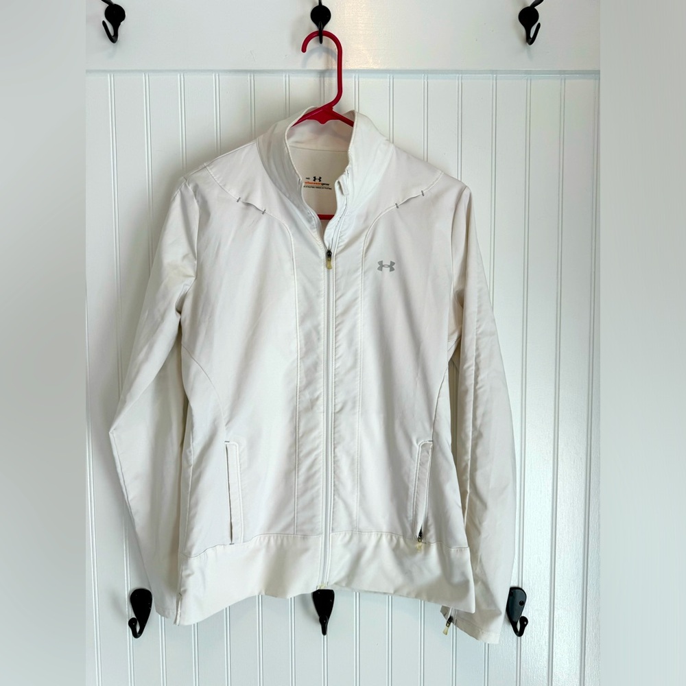 Women's Under Armour all season zip up jacket. White, size medium.